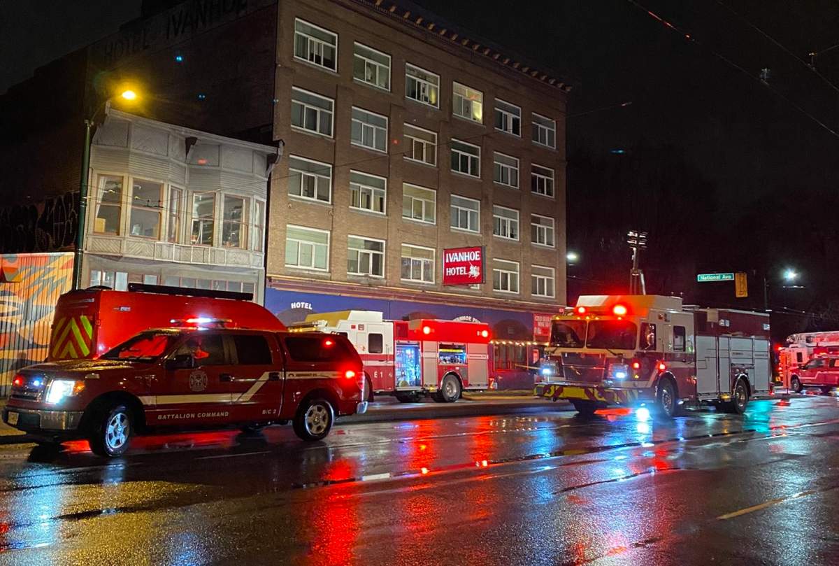Firefighters attend a suspicious fire at Vancouver's Ivanhoe Hotel on Saturday night. 