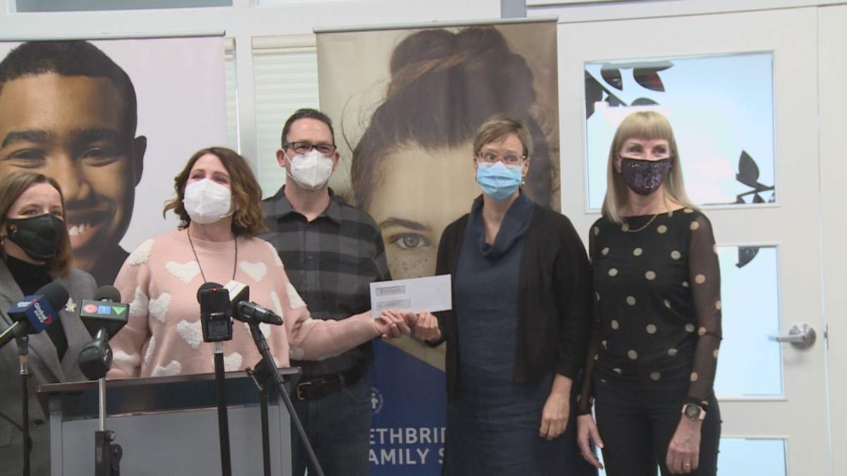 Kim and Trina Tymko present a cheque to Lethbridge Family Services' counselling department on Friday, January 28, 2022.