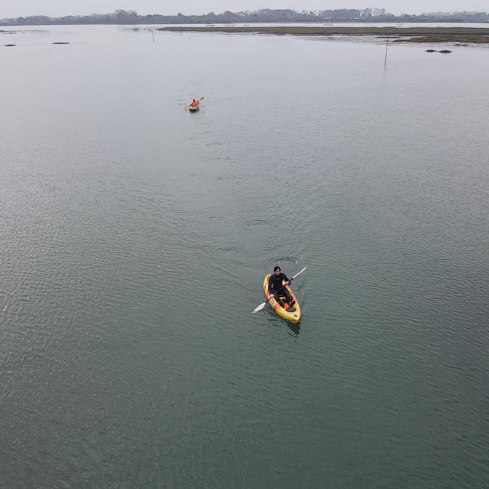 A kayak rescue team heads out to the mudflats to try and rescue Millie.
