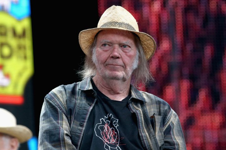 Neil Young threatens to pull music from Spotify over Joe Rogan vaccine ‘disinformation’