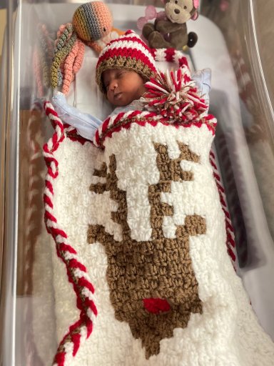 The NICU Crocheters make hats, blankets, and other outfits for families with babies going through intensive care.