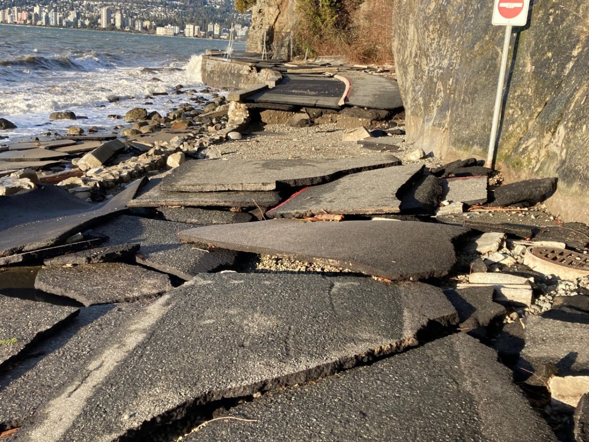 A portion of the Stanley Park seawall is seen badly damaged on Fri. Jan. 7, 2022, after a massive storm and king tide battered the shores in Vancouver.