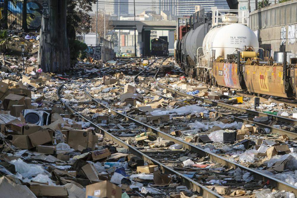 thousands of packages are seen on the train tracks