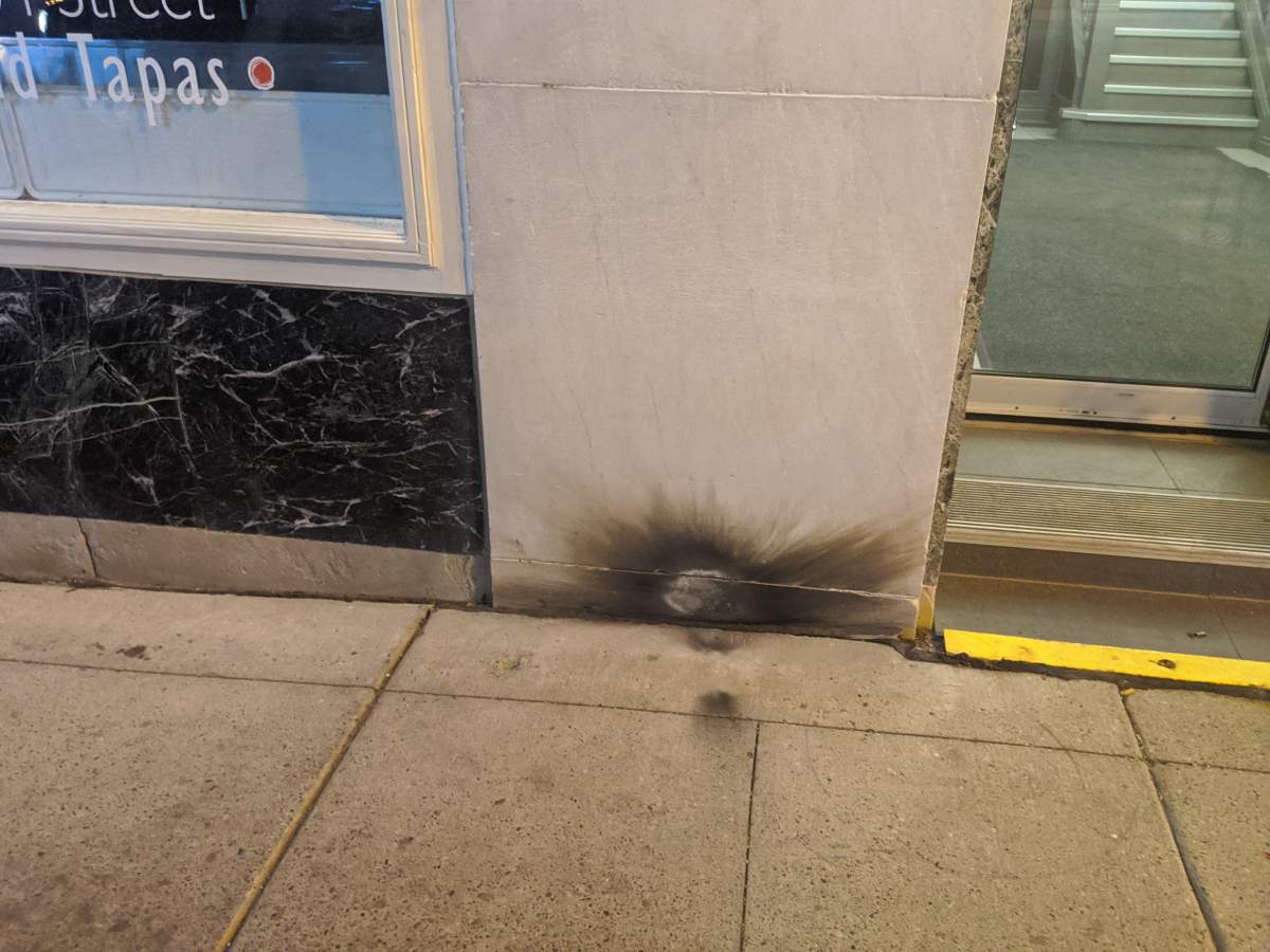 Damage done to Tzin Wine & Tapas in downtown Edmonton during a police arrest in August 2021.