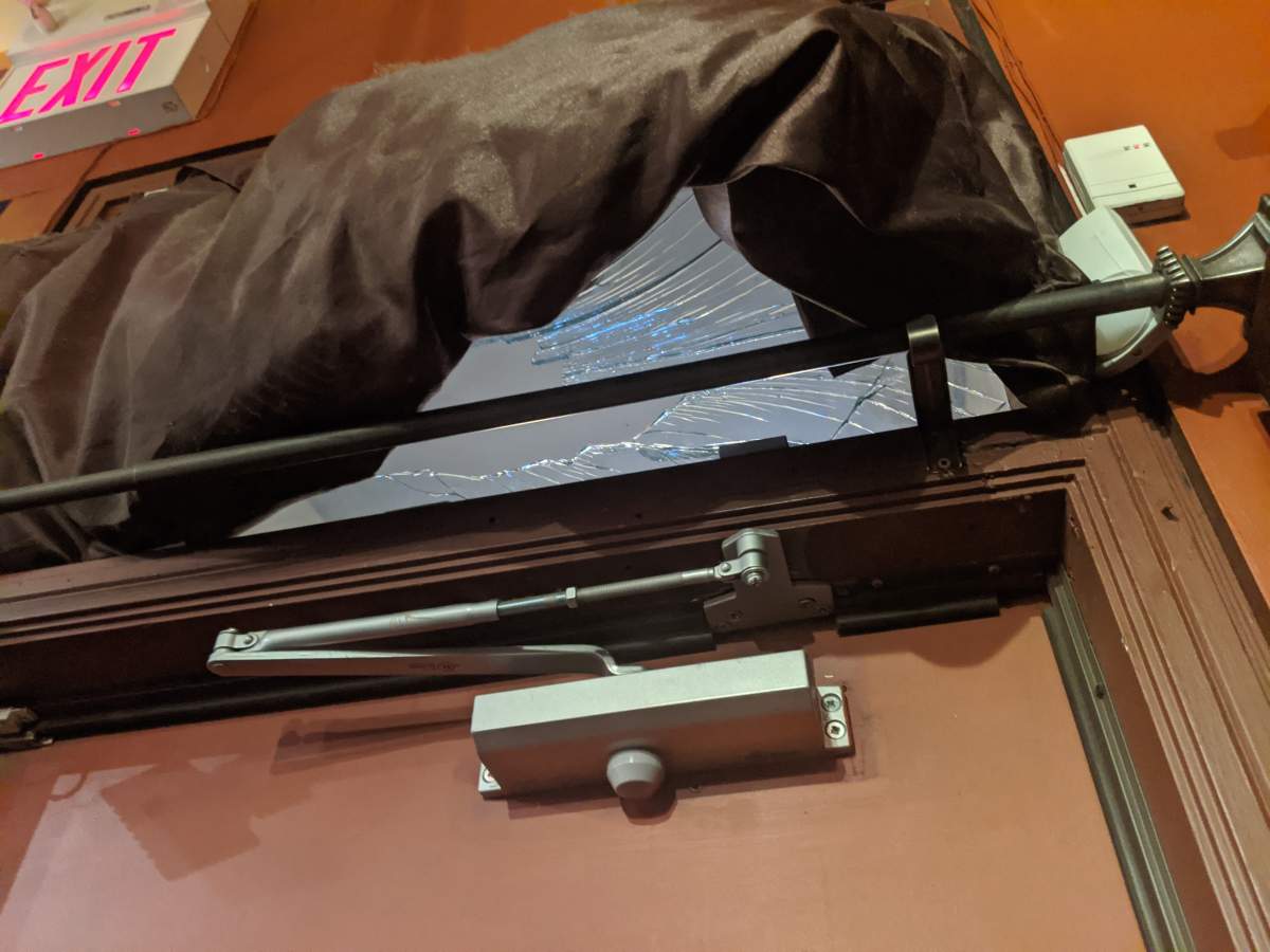 Damage done to Tzin Wine & Tapas in downtown Edmonton during a police arrest in August 2021.