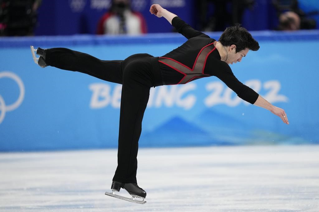 Keegan Messing, of Canada, competes during the men’s short program figure skating competition at the 2022 Winter Olympics in Beijing, Tuesday, Feb. 8, 2022. THE CANADIAN PRESS/AP-Bernat Armangue
