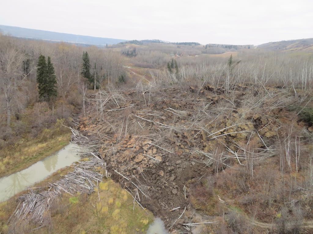 A slow moving landslide is seen inching down a hillside in northern British Columbia, prompting the evacuation of nearby Old Fort, B.C., in an undated handout photo.