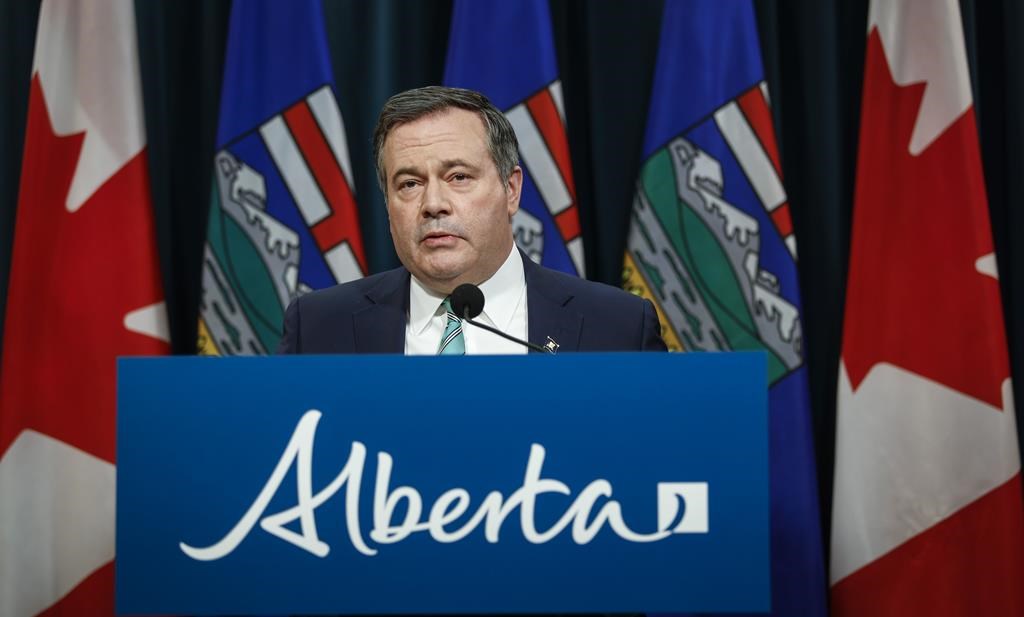 Alberta Premier Jason Kenney gives a COVID-19 update in Calgary on Tuesday, Feb. 8, 2022.