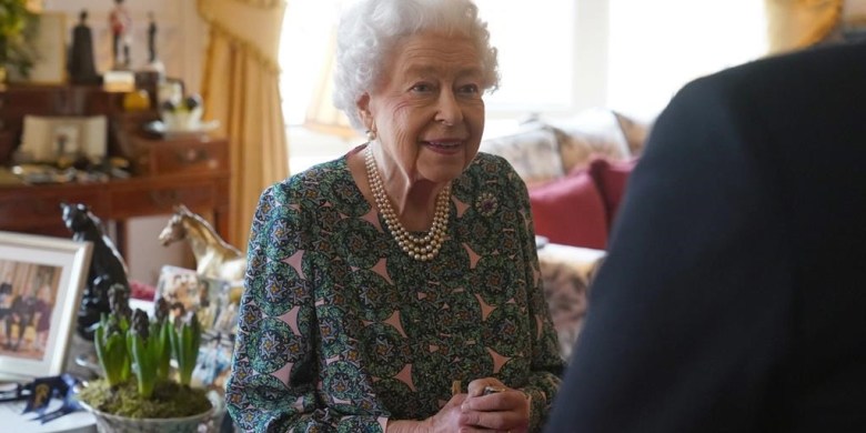 Queen Elizabeth postpones more meetings, still suffering COVID symptoms