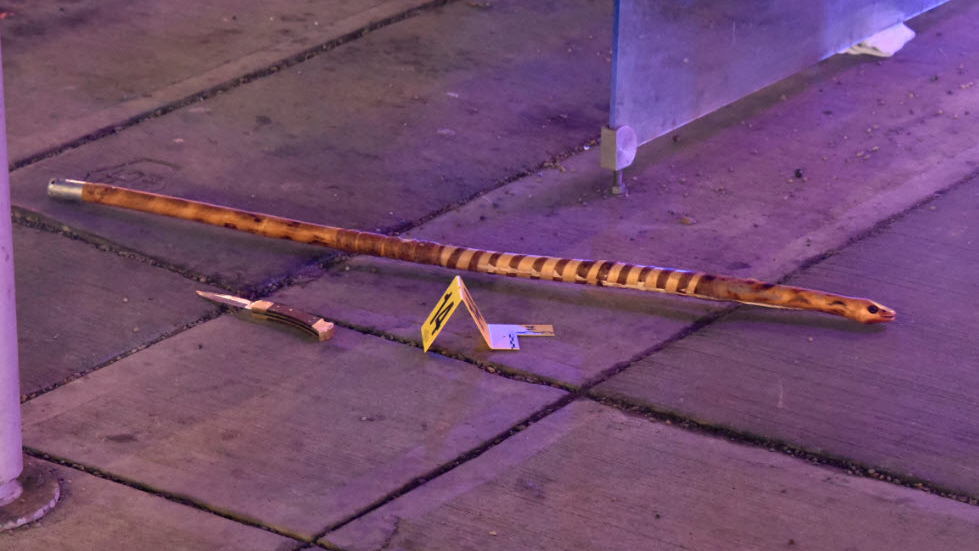 The stick and the knife involved in Calgary’s fatal shooting on Feb. 19, 2022.