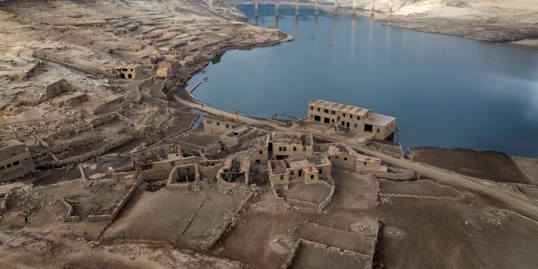 Incredible photos show Spanish ghost village emerge after 30 years underwater