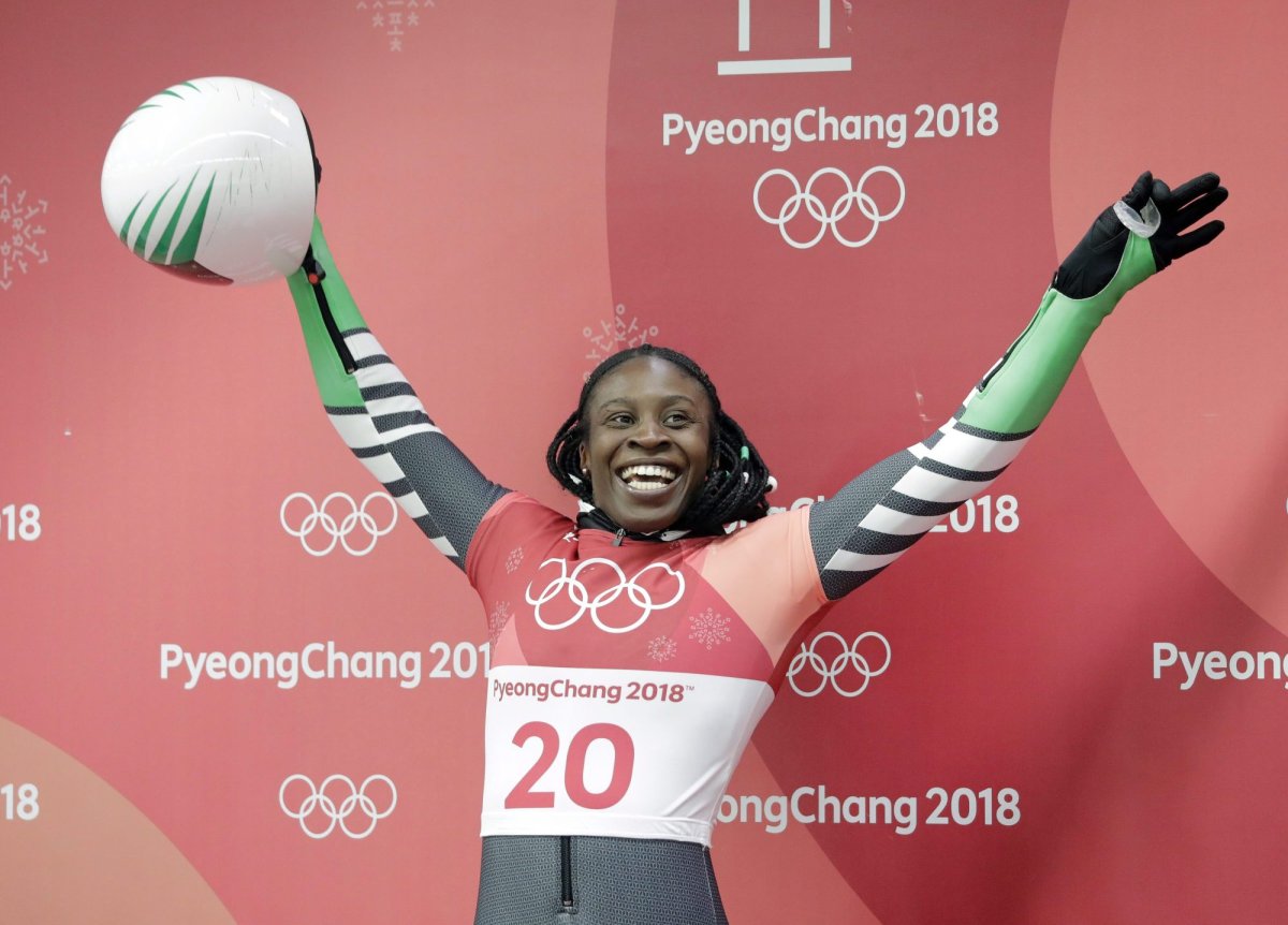 Simidele Adeagbo of Nigeria reacts in the finish area after the final run of the women's skeleton competition at the 2018 Winter Olympics in Pyeongchang, South Korea on Feb. 17, 2018.