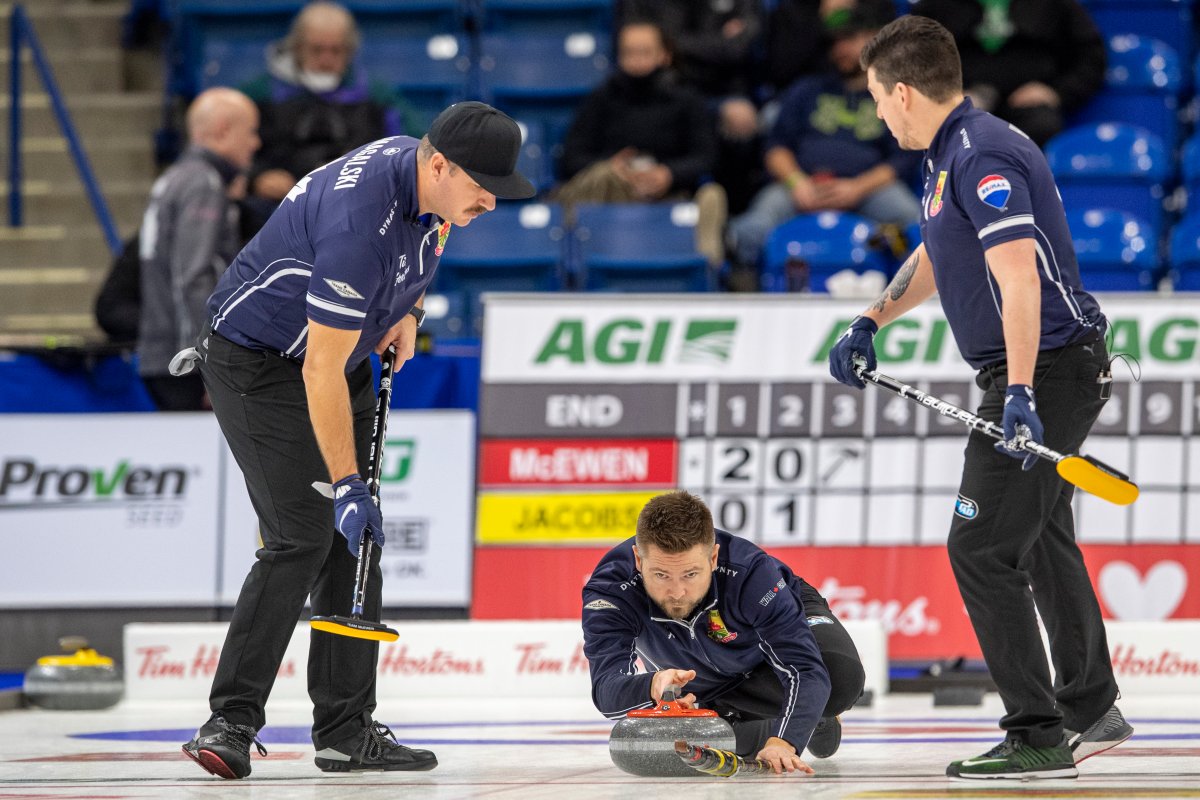 Team McEwen skip Mike McEwen throws against Team Jacobs during Draw 16 of the 2021 Canadian Olympic curling trials in Saskatoon, Friday, November 26, 2021.