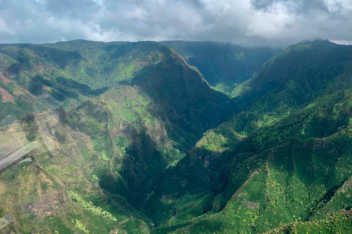 FILE - An area near the Na Pali Coast on the island of Kauai in Hawaii is shown as seen from the air on Dec. 17, 2019.  (AP Photo/Maryclaire Dale, File).