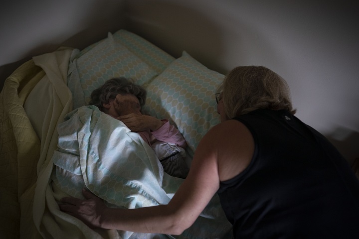 Susan Ryder wakes her mother, Betty Bednarowski.