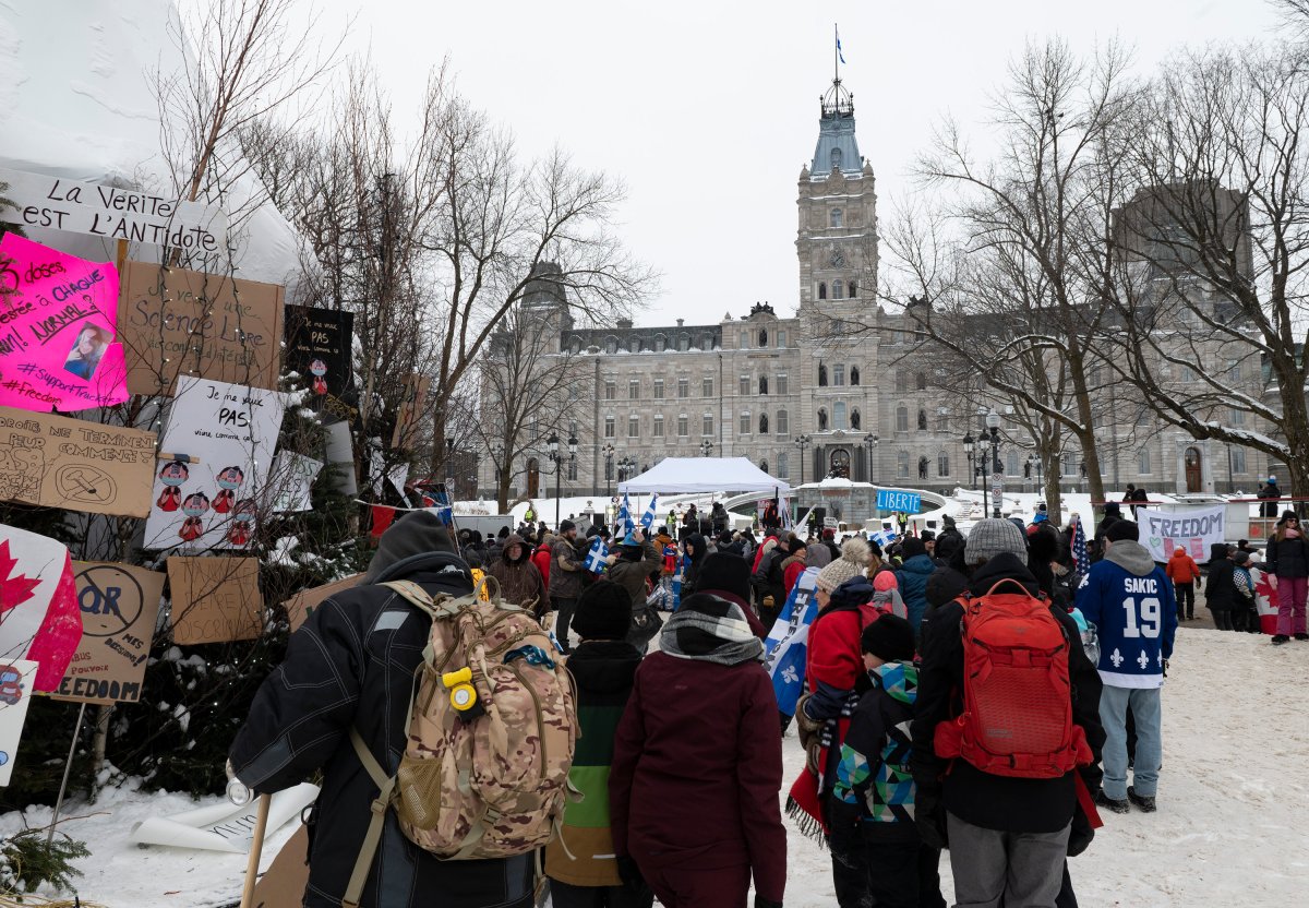Hundreds of people demonstrate against COVID-19 measures in front of the legislature, Sunday, February 6, 2022  in Quebec City. 