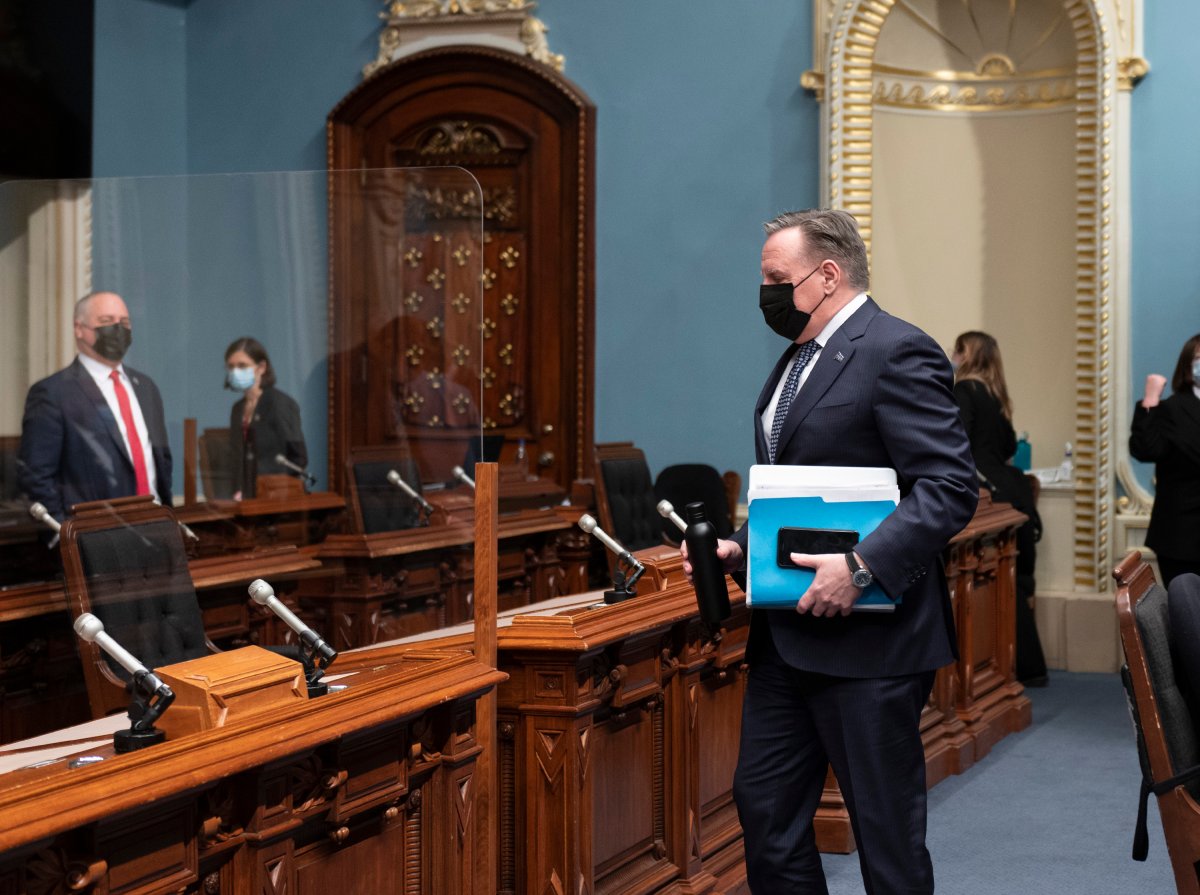 Quebec Premier Francois Legault walks in for question period, Tuesday, February 8, 2022 at the legislature in Quebec City. 
