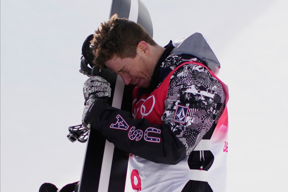 United States' Shaun White gets emotional after the men's halfpipe finals at the 2022 Winter Olympics, Friday, Feb. 11, 2022, in Zhangjiakou, China. (AP Photo/Lee Jin-man).