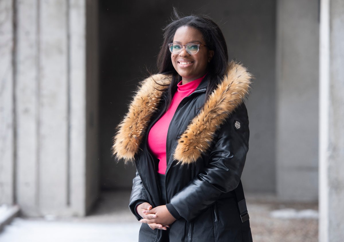 Nurse Stephanie Bumba poses outside the University of Montreal in Montreal, Thursday, February 3, 2022. Bumba, who is of Congolese descent, is among the 37 per cent of employed Black women in Quebec who work in the province's health-care system. 