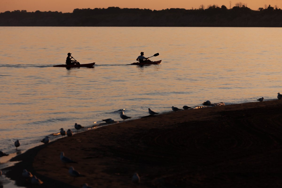 Two kayakers paddle their kayaks on Lake Erie at Port Stanley, Ont, on June 16, 2020. 