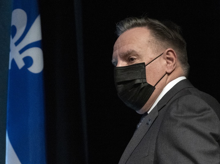 Quebec Premier François Legault  arrives at a COVID-19 press briefing Thursday January 13, 2022 in Montreal.THE CANADIAN PRESS/Ryan Remiorz.