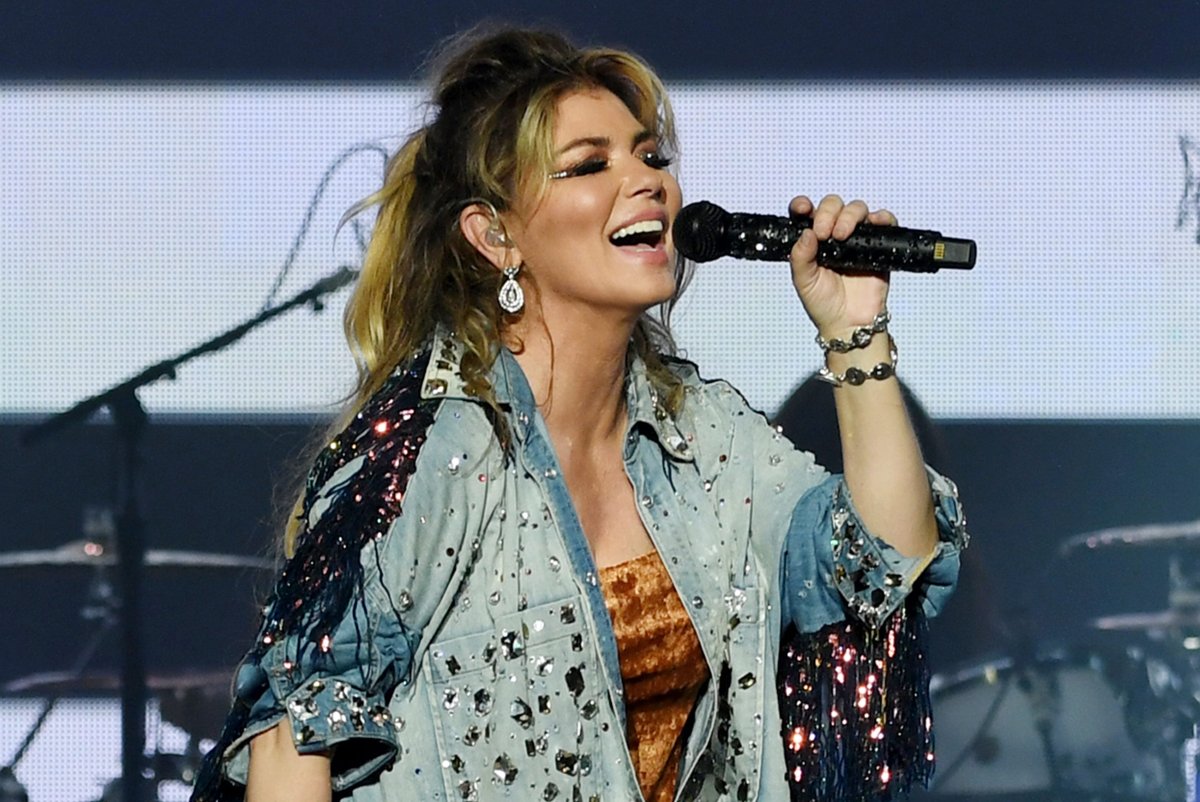 Shania Twain performs on stage.