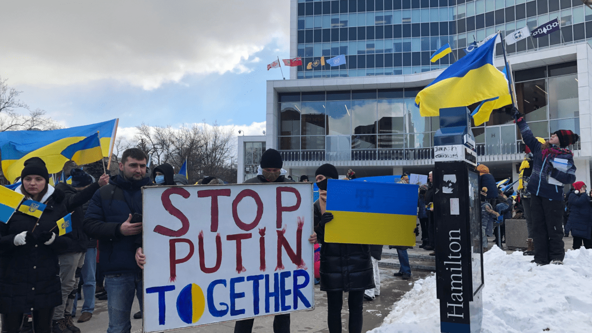 Ukrainian supporters gather at a rally in Hamilton's city hall forecourt on Feb. 27, 2022.