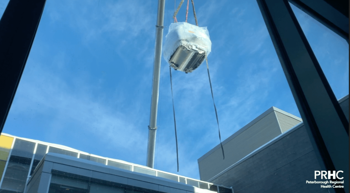 Screenshot of video showing the second MRI being lowered into Peterborough Regional Health Centre on Jan. 28, 2022.