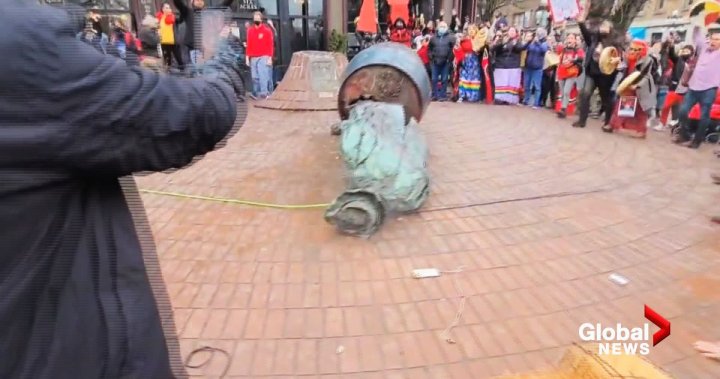 Gassy Jack statue in Vancouver’s Gastown toppled during women’s memorial march, video shows