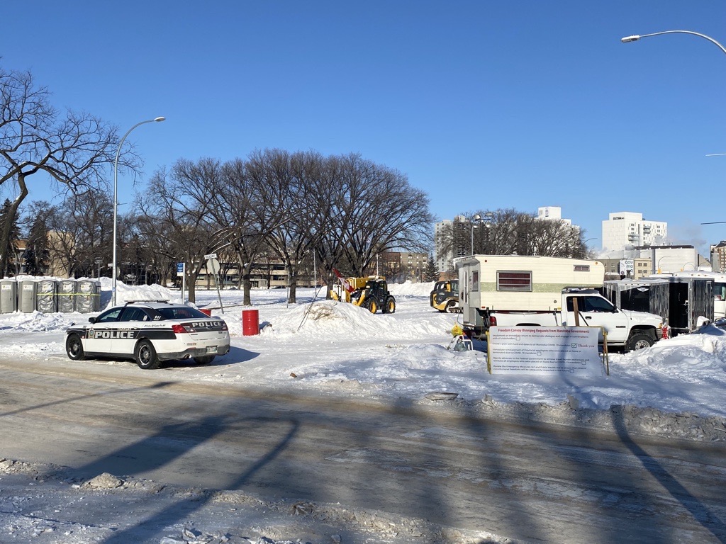 A Winnipeg police vehicle outside the protest encampment at Memorial Park in February.