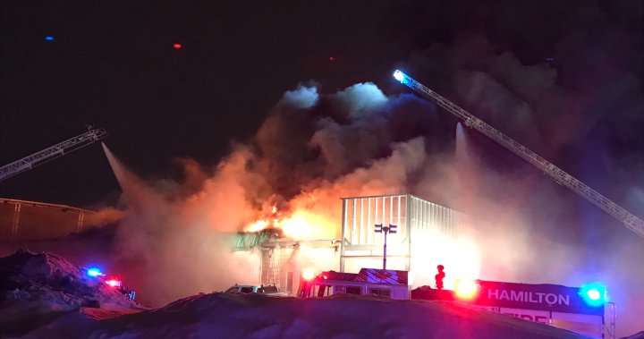 Firefighters battle multiple alarm blaze at commercial building on east Mountain