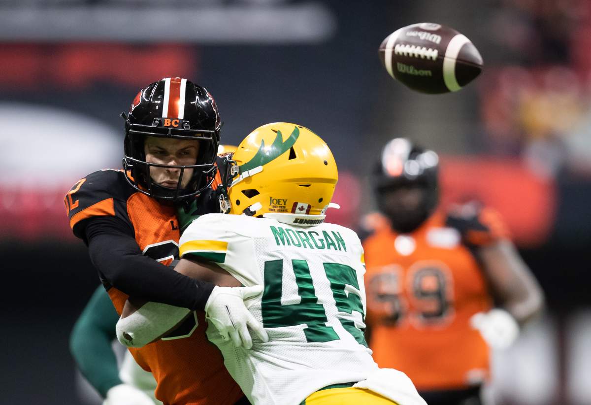 Nyles Morgan make a tackle against a Lions receiver