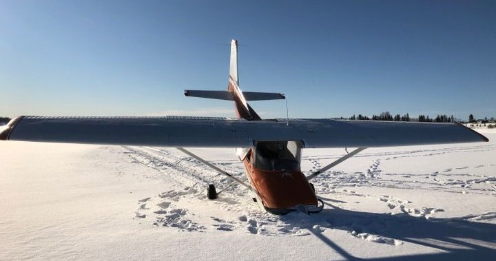 Pilot uninjured after small plane crashes on frozen lake in central Alberta