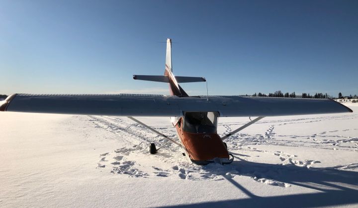 Pilot uninjured after small plane crashes on frozen lake in central Alberta