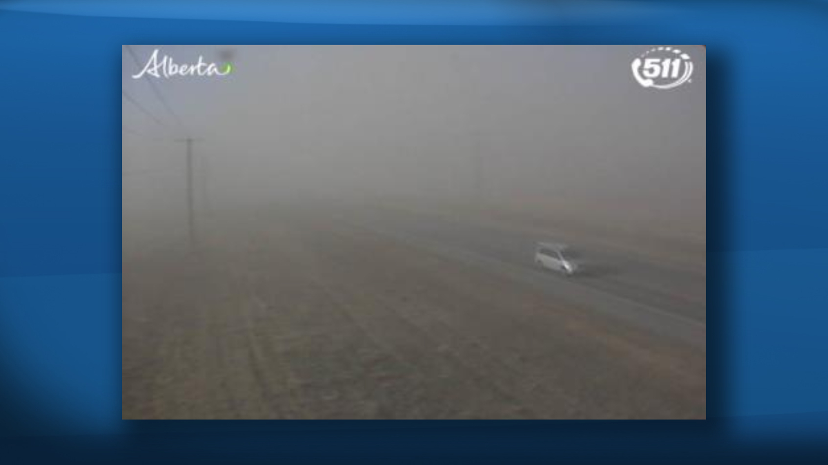 Dust storm on Highway 3, east of Taber, as seen from a 511 Alberta traffic camera on Monday, Feb. 7, 2022.