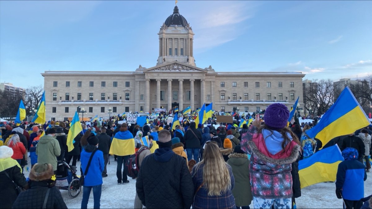 Hundreds gather on the grounds of the Manitoba Legislative Building Feb. 26 for a show of solidarity with Ukraine.