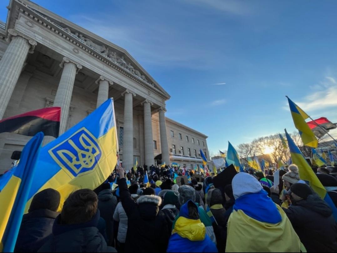 Hundreds gather on the grounds of the Manitoba Legislative Building Saturday afternoon for a show of solidarity with Ukraine.