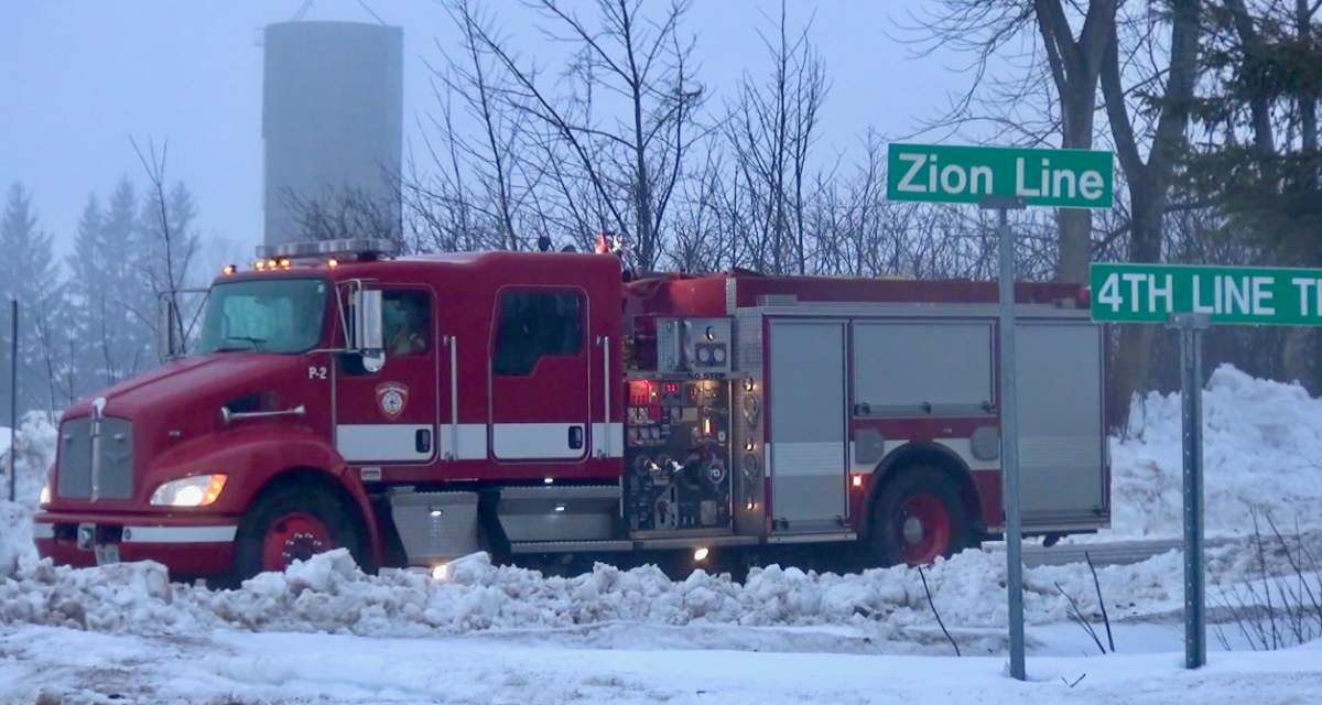 Cavan-Monaghan Township firefighters closed off access to Zion Road following a school bus crash on Feb. 22, 2022.