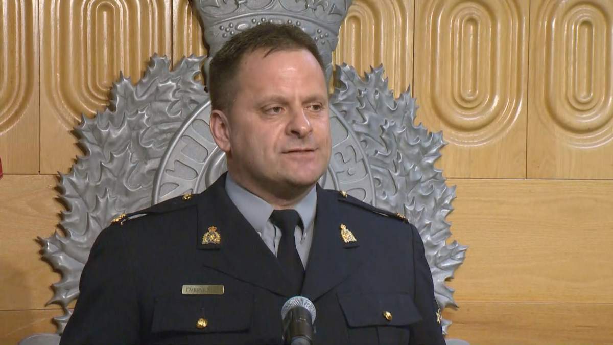 Lead RCMP investigator on the case, Darryl Bilo, speaks to reporters. RCMP say that while they believe people were helping Michael stay on the run, nobody else has been charged.