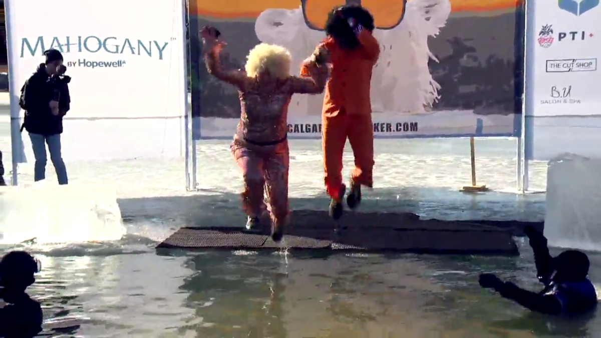 Calgarians dove into cold waters for the annual Icebreaker Polar Dip on Saturday, Feb. 12, 2022.