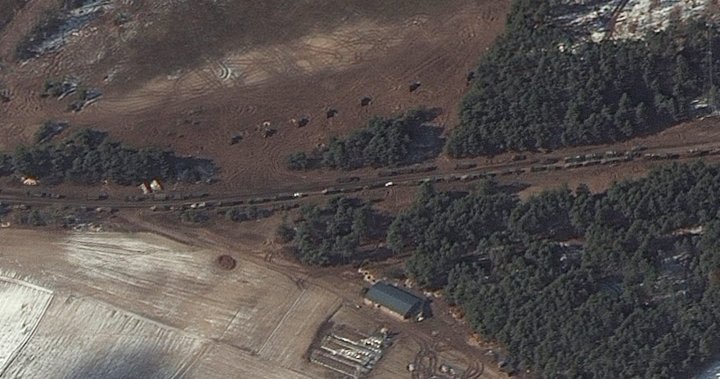 Russian convoy outside Kyiv has redeployed into firing positions, satellite photos show
