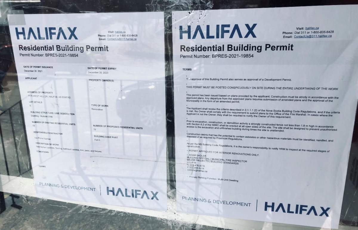 A residential building permit is seen outside of 11 Forest Hill Dr. in Halifax.