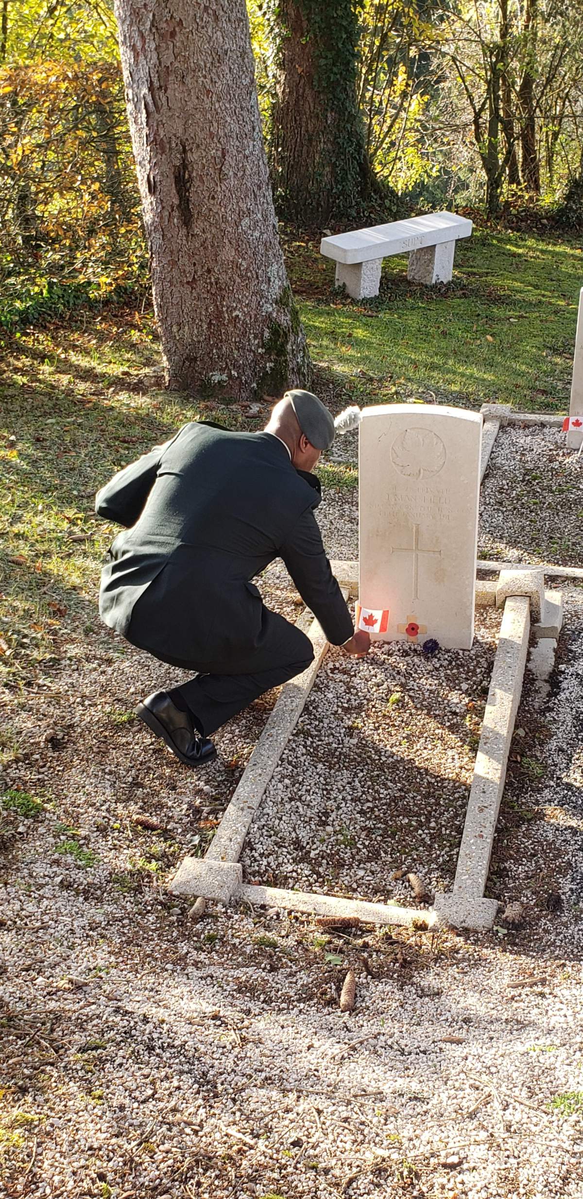 2Lt. Jerome Downey pays his respects at the Commonwealth gravesite of No. 2 Construction Battalion soldiers in Jura, France.
