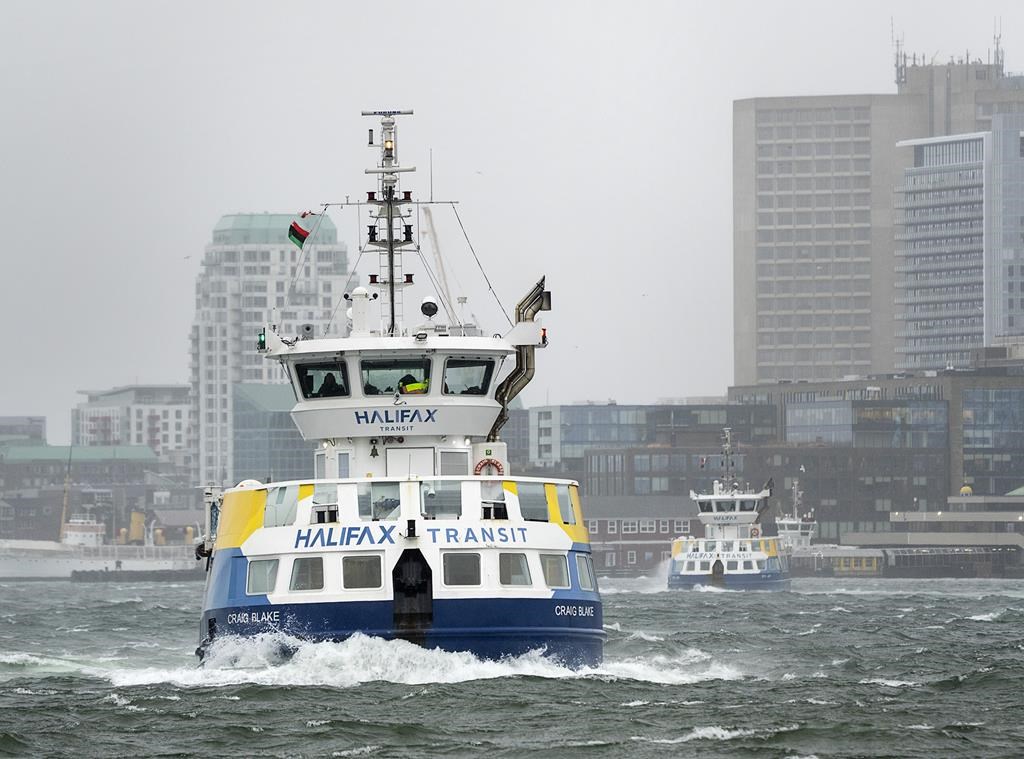FILE PHOTO: The Halifax Transit ferries Craig Blake, left, and Rita Joe cross Halifax harbour on Friday, Feb. 18, 2022. THE CANADIAN PRESS/Andrew Vaughan.