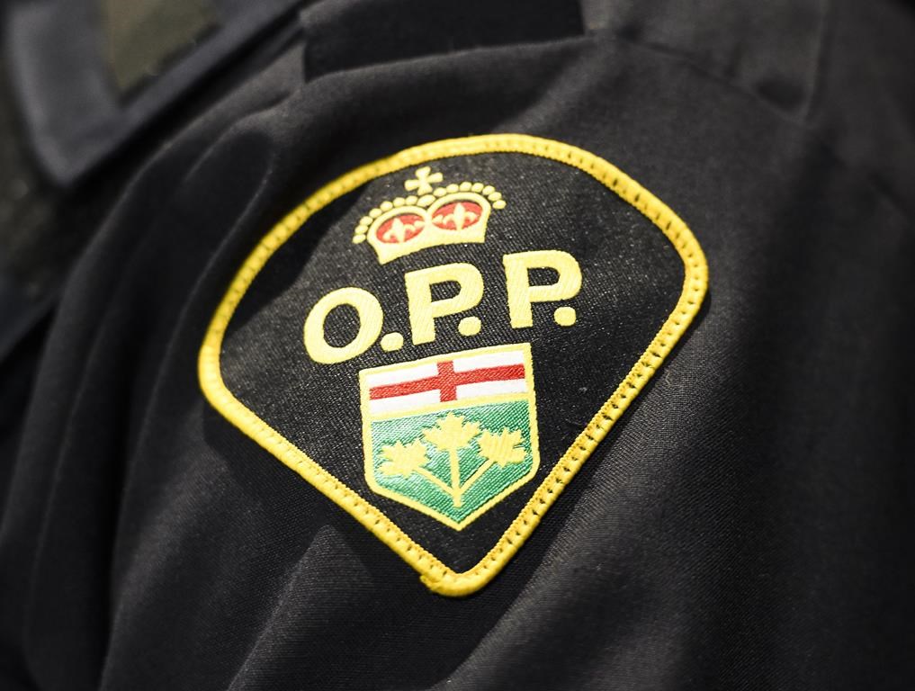 An Ontario Provincial Police logo is shown during a press conference in Barrie, Ont., on Wednesday, April 3, 2019. THE CANADIAN PRESS/Nathan Denette.