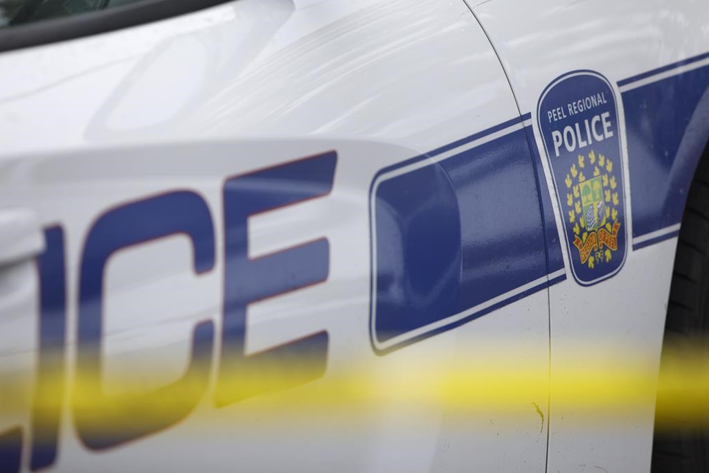 A Peel Regional Police car is seen on Thursday, Nov. 7, 2019. Members of a mosque in Mississauga, Ont., are raising money to repair the damage that was done, increase security measures and offer mental health supports after a 24-year-old man allegedly attacked people during a prayer on Saturday morning. THE CANADIAN PRESS/Cole Burston.