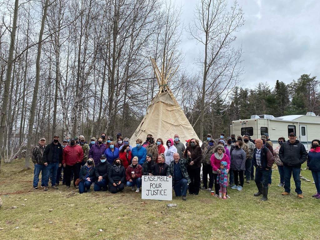 Some members of the 67 families who continue the fight with Parks Canada over expropriation are shown in Kouchibouguac National Park in New Brunswick on Wednesday, May 19, 2021. For more than 50 years, the Vautours have claimed they are Acadian-Métis and have the permission of Steven Augustine, a hereditary chief of the Mi'kmaq Grand Council, to remain on the property. 