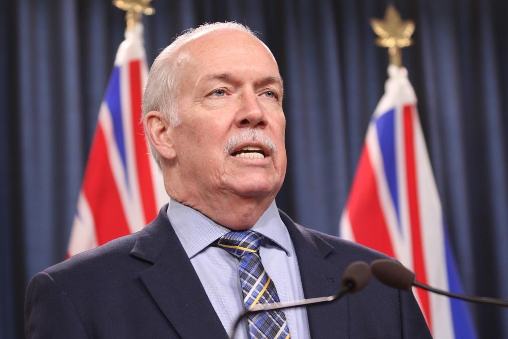 Premier John Horgan answers questions during a news conference at the legislature in Victoria, Friday, March 11, 2022. Horgan says drivers in British Columbia will get a one-time relief rebate to help deal with the cost of rising gas prices caused by Russia's invasion of Ukraine. 