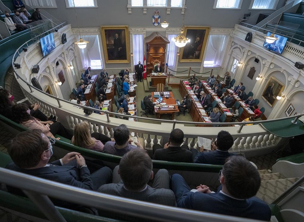 A limited number of visitors, as COVID-19 restrictions are eased, attend the spring session of the Nova Scotia legislature at Province House in Halifax on Thursday, March 24, 2022. THE CANADIAN PRESS/Andrew Vaughan.