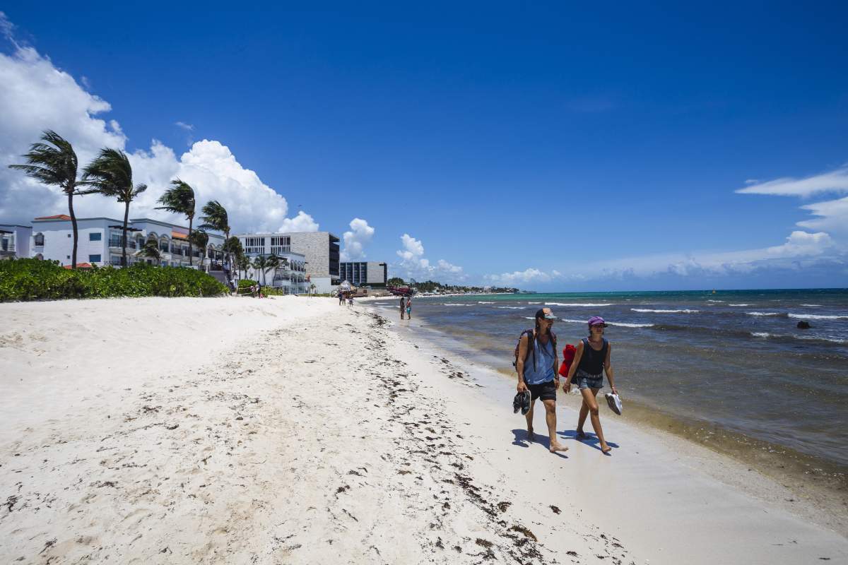 Tourists enjoy the last hours on the beach before arrival of Hurricane "Grace" in Playa del Carmen, in the Mexican Caribbean.
